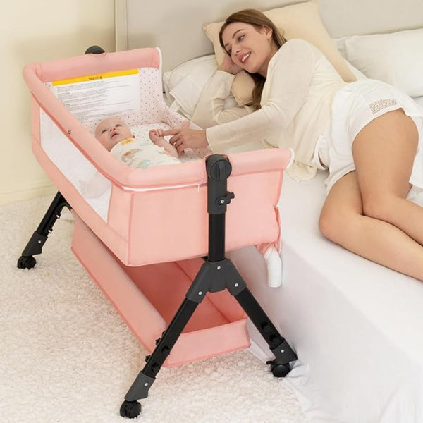 kmaier Baby Bassinet Sleeper, Adjustable Baby Crib for Baby, Rocking Bassinets Bedside Sleeper, Easy to Fold Portable Crib Side Bassinet with Wheels and Storage Basket - Pink